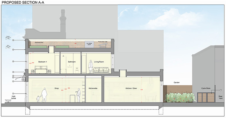 Section drawing showing new one-bedroom flat above existing shop, highlighting internal layout, floor levels, and structural integration